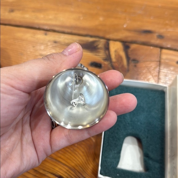 Reed & Barton Silver Bell with Toddler holding a sock - Picture 3 of 7